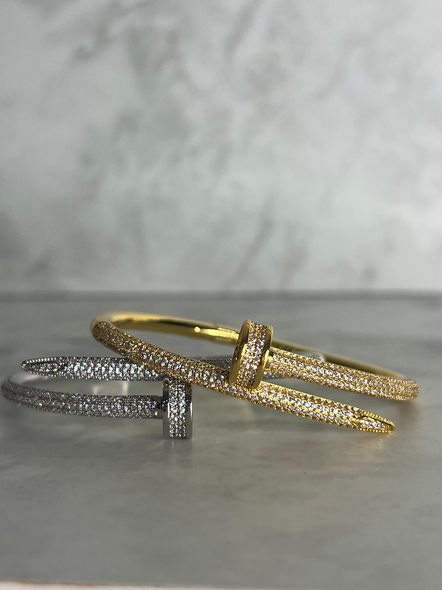 Paved screw bangle